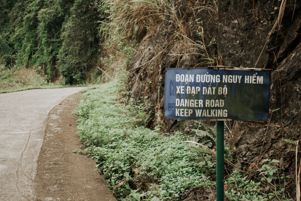 Road sign from Cat Ba Travel Guide by Annie Miller
