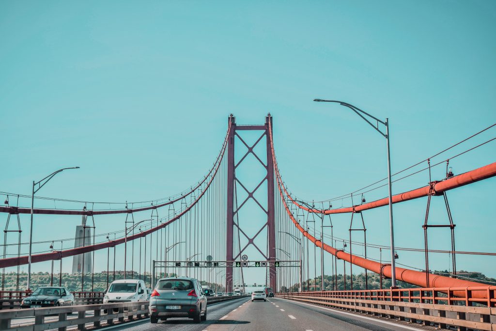Bridge leaving Lisbon, Portugal by Annie Miller in Portugal Road Trip
