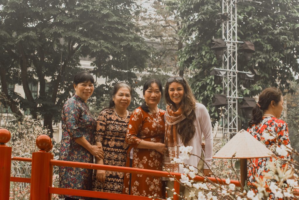 Annie Miller with local residents in Hanoi, Vietnam
