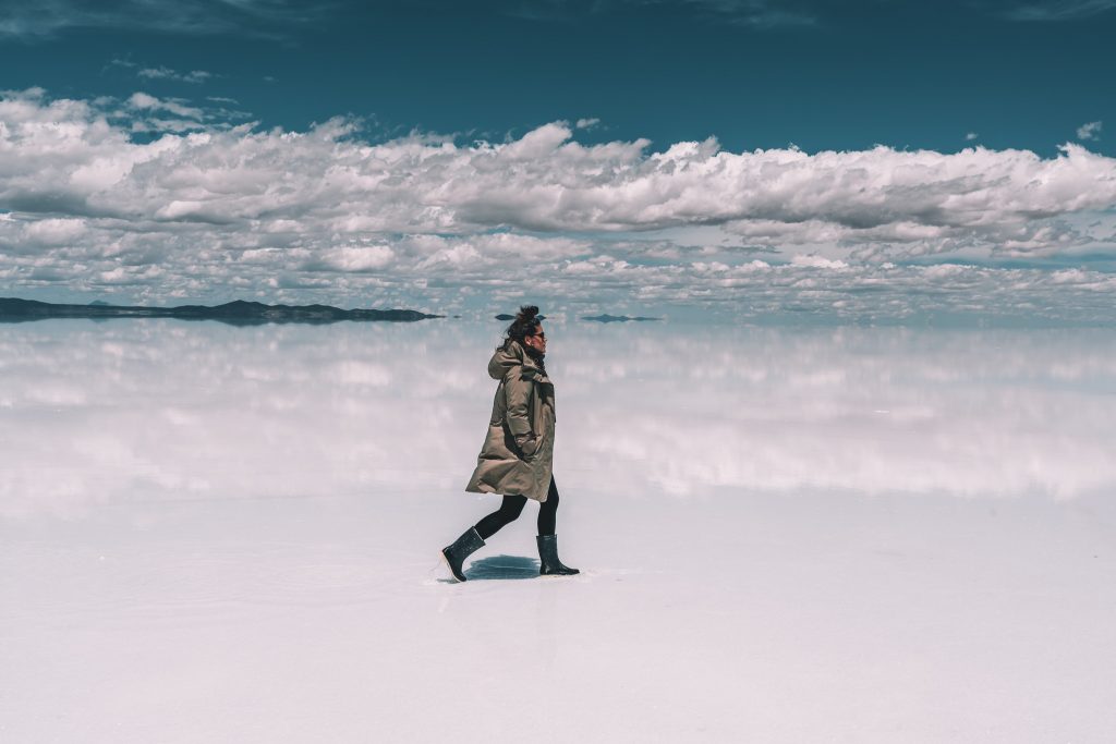Annie Miller walking through the Uyuni Salt Flats in 2020