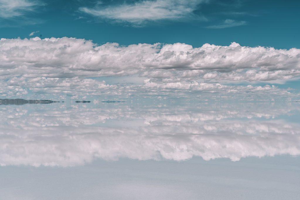 Clouds reflecting on the flats in Uyuni